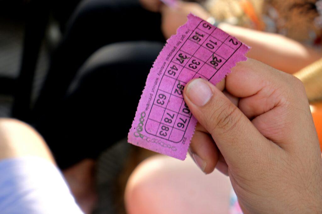 hand holding bingo ticket